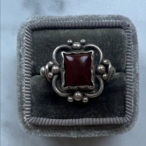 Elegant Silver and Red Gemstone Ring